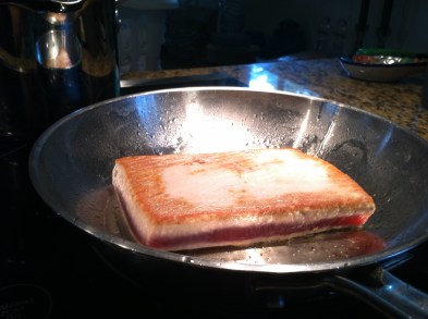 Pan sear on med-high heat to form a nice crisp crust. Once 1/4" has cooked to opaque, turn it over just to color the other side. 